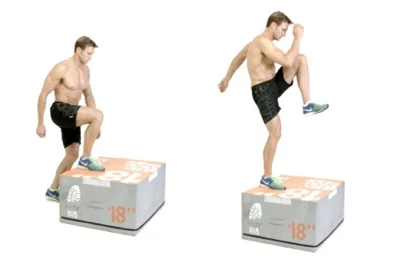 Man doing a step-up onto an 18 inch box, then driving the other knee up to hip height at the top