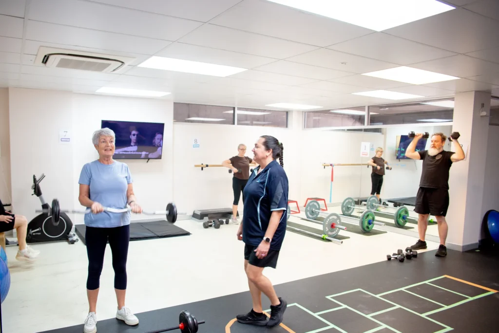 A small exercise class in the clinic gym on Eyre Street